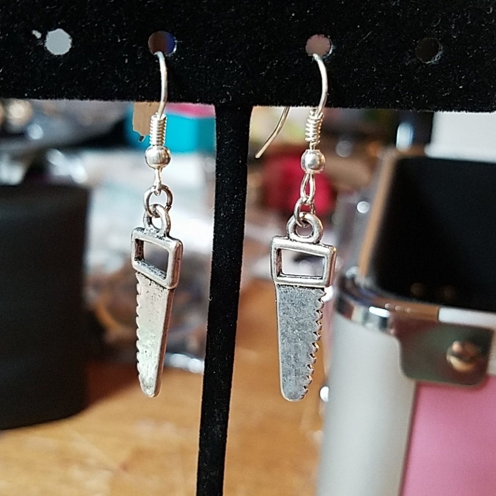 Hacksaw Silver Tone Earrings
